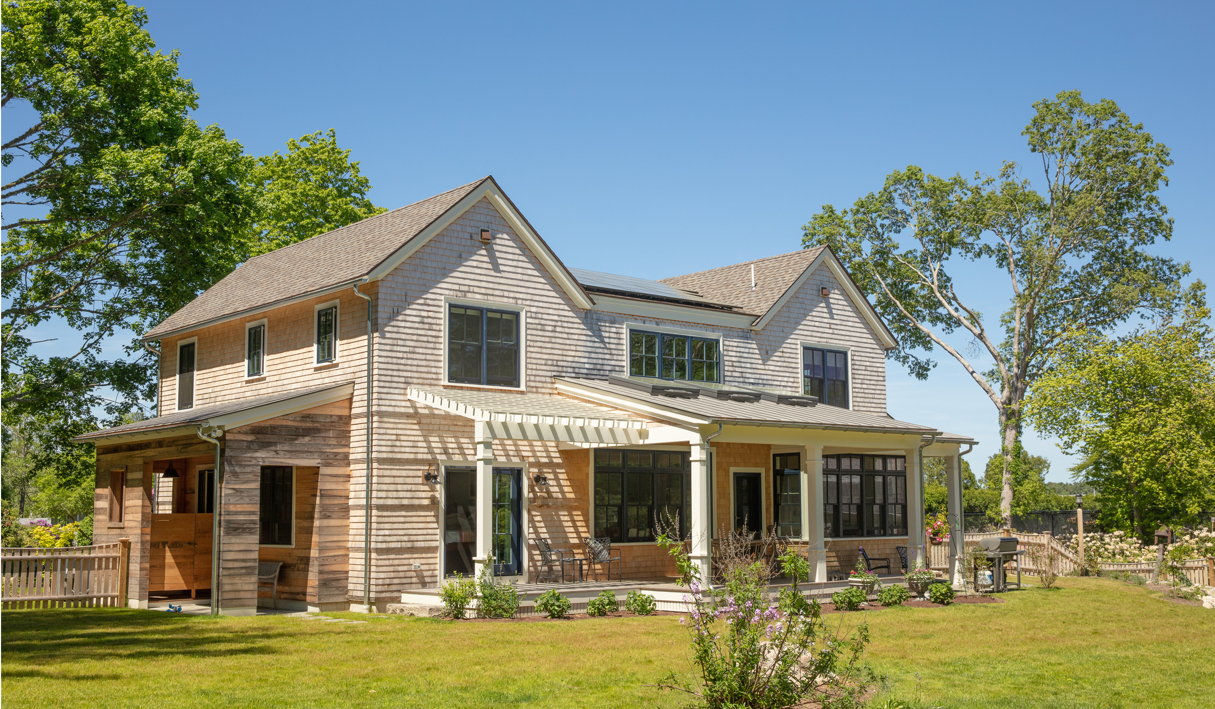 New cottage style home with covered porch on Cape Cod